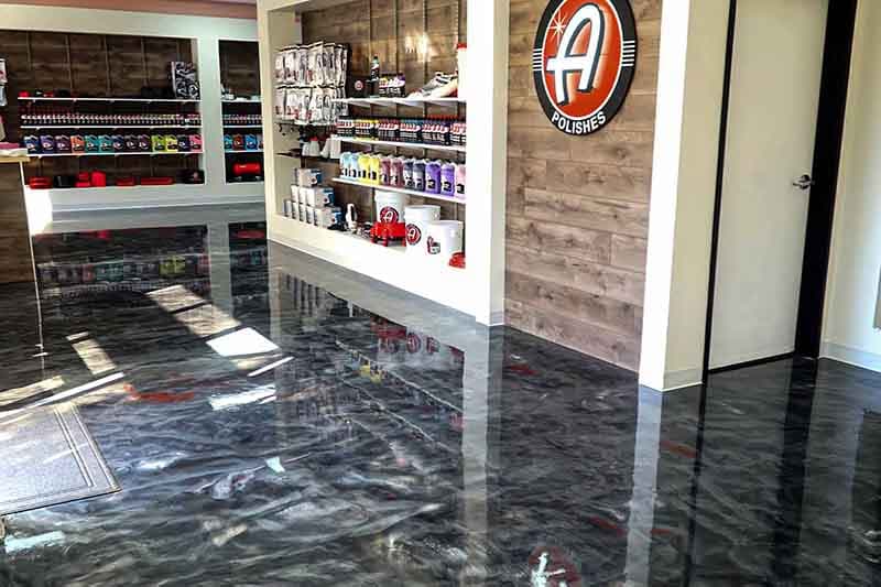 Beautiful metallic epoxy floor coating inside a Gresham garage.