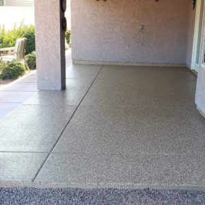 Natural polyurea flake floor on an outdoor patio.