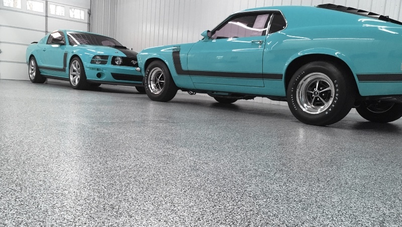 garage floor coating with turquoise sports cars