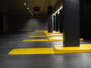 commercial garage floor coating with yellow stripes