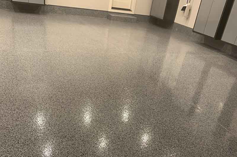 A freshly coated garage floor with polyurea coating