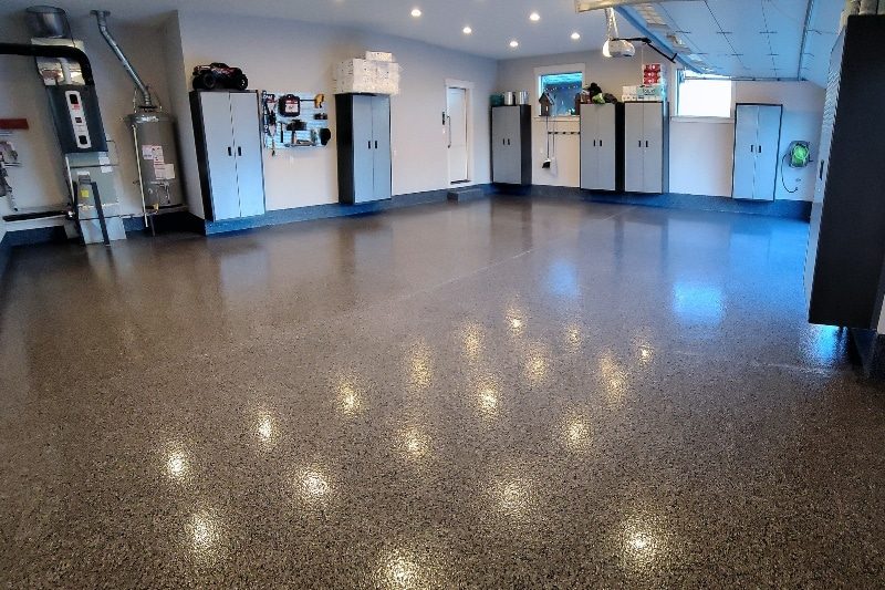 Basement-like facility now has flake midnight black epoxy coated floor